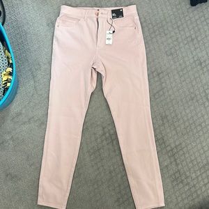 Skinny light pink high rise express jeans